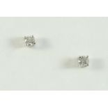 A PAIR OF DIAMOND STUD EARRINGS set with brilliant-cut diamonds weighing approximately 0.50 carats