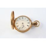 A 14CT GOLD FULL HUNTING CASED POCKET WATCH BY WALTHAM the white enamel dial signed A.W.Co.,