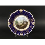 BLOOR DERBY DISH early 19th century, painted with a named view of Cardiff Castle inside a blue and