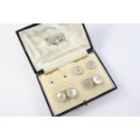A PAIR OF MOTHER-OF-PEARL AND GOLD CUFFLINKS each mother-of-pearl disc is set in 9ct gold,