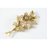 AN ANTIQUE DIAMOND FOLIATE SPRAY BROOCH set overall with graduated rose-cut diamonds, in gold, 7cm
