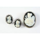 A HARDSTONE CAMEO BROOCH depicting a classical woman holding a peacock, in a silver mount, 4 x 3cm.,