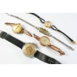 A LADY'S GOLD WRISTWATCH BY TUDOR the signed circular dial with Arabic quarters and dagger numerals,