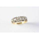 A VICTORIAN DIAMOND FIVE STONE RING the five graduated old circular-cut diamonds are set with rose-