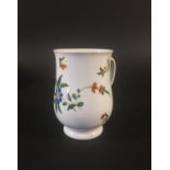 COOKWORTHY BRISTOL PORCELAIN MUG circa 1770, of bell form, poloychrome painted with flowers, old