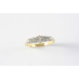 A DIAMOND FIVE STONE RING the five graduated circular-cut diamonds are set in 18ct gold and