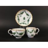 CHAMPIONS BRISTOL TRIO circa 1775, painted in green camieu with floral garlands and scattered