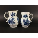 TWO WORCESTER JUGS circa 1760-70, blue printed in the Natural Sprays pattern, hatched crescent