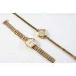 A LADY'S GOLD WRISTWATCH BY OMEGA the signed circular white dial with baton numerals, on an openwork