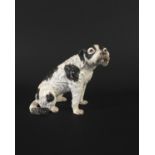 MEISSEN HOUND circa 1750, after Kaendler, modelled seated, with black patches, height 10cm