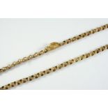 A GEORGIAN GOLD CHAIN NECKLACE formed with granulated oval shaped links with applied decoration to a