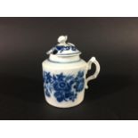 CAUGHLEY BLUE PRINTED MUSTARD POT AND COVER late 18th century, in a version of the Three Flowers