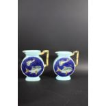 PAIR OF MAJOLICA JUGS - JOSEPH HOLDCROFT a pair of majolica aesthetic movement jugs, with a Fish
