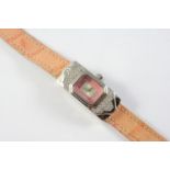 A LADY'S DIAMOND WRISTWATCH BY KUTCHINSKY the pink enamel dial signed Kutchinsky, with circular-