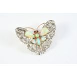 A VICTORIAN DIAMOND AND OPAL BUTTERFLY BROOCH the body mounted with solid white opals, the wings