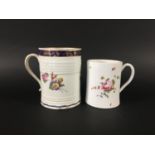 DERBY GLASS BOTTOMED MUG painted with floral sprays between blue and gilt rim and foot, height 12cm;