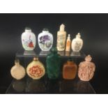COLLECTION OF CHINESE SNUFF BOTTLES in various materials including ivory, porcelain, cloisonne and