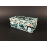 CHINESE PEN TRAY AND COVER of rectangular form, enamelled with a scrolling dragon in black and
