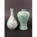 KOREAN MEIPING SHAPED VASE with stork medallions on a floral ground, under a celadon glaze, two