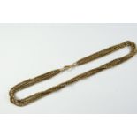 A 9CT GOLD FOUR ROW PIERCED LINK WATCH CHAIN 38cm long, 18.4 grams