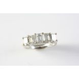 A DIAMOND FIVE STONE RING the five graduated emerald-cut diamonds weigh approximately 2.20 carats in