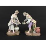PAIR OF MEISSEN FIGURES late 19th or early 20th century, modelled as a rustic couple with a hat
