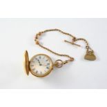 A LADY'S 18CT GOLD FOB WATCH the white enamel dial with Roman numerals, with blue enamel numerals