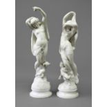 PAIR OF WHITE MARBLE FIGURES 20th century, of scantilly clad maidens and cherubs on domed bases,