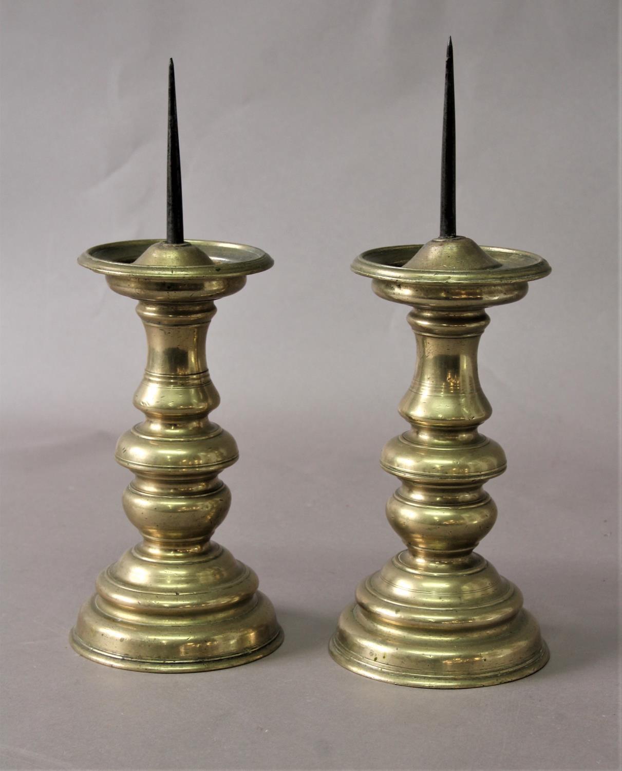 PAIR OF CONTINENTAL BRASS PRICKET CANDLESTICKS 17th century style, height 34cm (2)