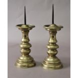 PAIR OF CONTINENTAL BRASS PRICKET CANDLESTICKS 17th century style, height 34cm (2)