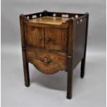 GEORGE III MAHOGANY TRAY TOP COMMODE with a pair of doors above the converted pot drawer, height