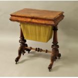 VICTORIAN WALNUT WORK TABLE the hinged cover enclosing a fitted interior, wavy apron and silk