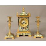 FRENCH CLOISONNE CLOCK GARNITURE the clock with a 2 1/2" gilt chapter ring on a brass, eight day