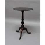 GEORGE III MAHOGANY CIRCULAR OCCASIONAL TABLE on a tapering and wrythen column and tripod base,
