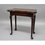 GEORGE II MAHOGANY FOLD OUT CARD TABLE the shaped rectangular top enclosing a baize lined interior