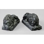 AFTER CANOVA pair of recumbent lions, probably green serpentine, height 10cm, width 19.5cm, depth