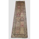 KASHMIR SILK RUNNER the polychrome compartmentalised field with two columns of Mihrabs above