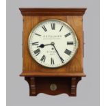 WALNUT WALL CLOCK the 11 1/2" dial inscribed JJ Elliott/Little Gray's Inn Lane/London/69617, on a