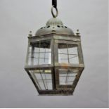 BRASS LANTERN of hexagonal form, with leaded glass panels, with floral decoration, height 45cm,