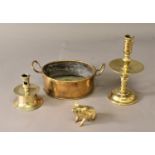 DUTCH HEEMSKERK STYLE CANDLESTICK with extracting holes, drip tray and domed foot, height 24cm; a