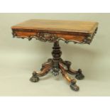 VICTORIAN ROSEWOOD FOLDOUT CARD TABLE the twisting top on a turned and carved column and scrolling