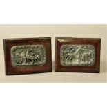 PAIR OF EQUESTRIAN METAL PLAQUES probably late 19th century, each with horses and a rider inside ivy