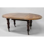 VICTORIAN MAHOGANY WINDOUT EXTENDING DINING TABLE the mechanism stamped Joseph Fitter, Birmingham,