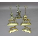 TWO PAIRS OF BRASS HORSE DOOR STOPS lengths 32cm and 24cm; together with three further brass door