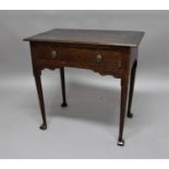 OAK SIDE TABLE mid 18th century, the two plank top above a single drawer, tapering legs and square