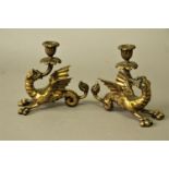 PAIR OF BRASS DRAGON CANDLESTICKS 19th century, holding the sconces in their mouths, length 19cm (