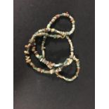ANTIQUITIES: Egyptian polychrome glazed composition mummy beads re-strung into a necklace, Late