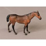 MANNER OF BERGMAN Cold painted bronze figure of a race horse, length 14cm