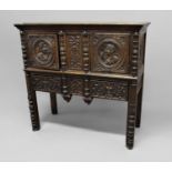 OAK RENAISSANCE BUFFET 16th century and later, the body with a pair of doors with Romayne carved