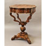 VICTORIAN ROSEWOOD AND INLAID SEWING TABLE the cartouche shaped top enclosing a fitted interior,